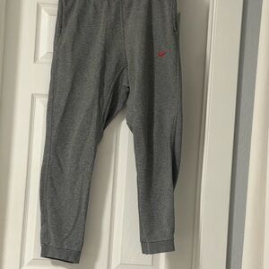 Nike Mens Team Club Charcoal Gray Joggers with Red Logo
